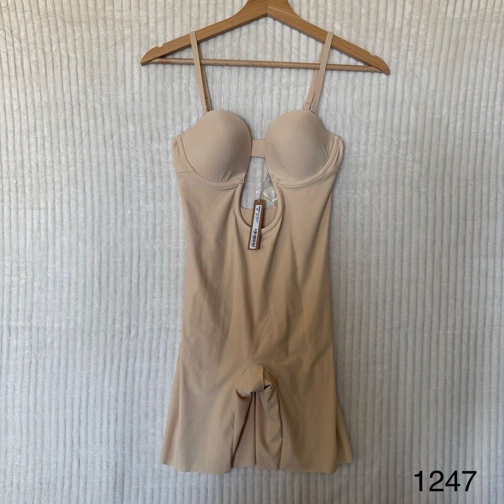 SKIMS Bodysuit in Nude with Sleek Design